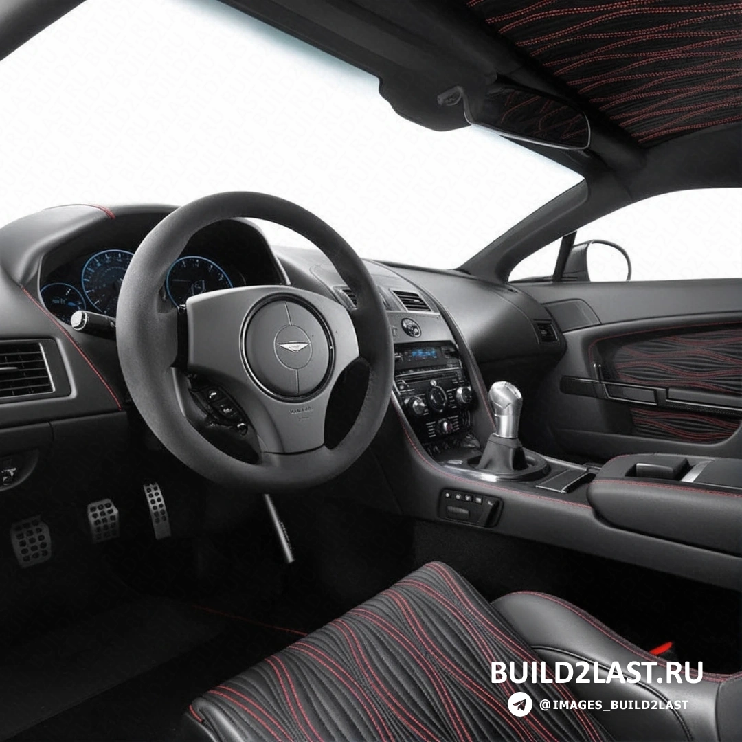 Салон черного автомобиля Aston Martin V12 Zagato с элементами роскоши.